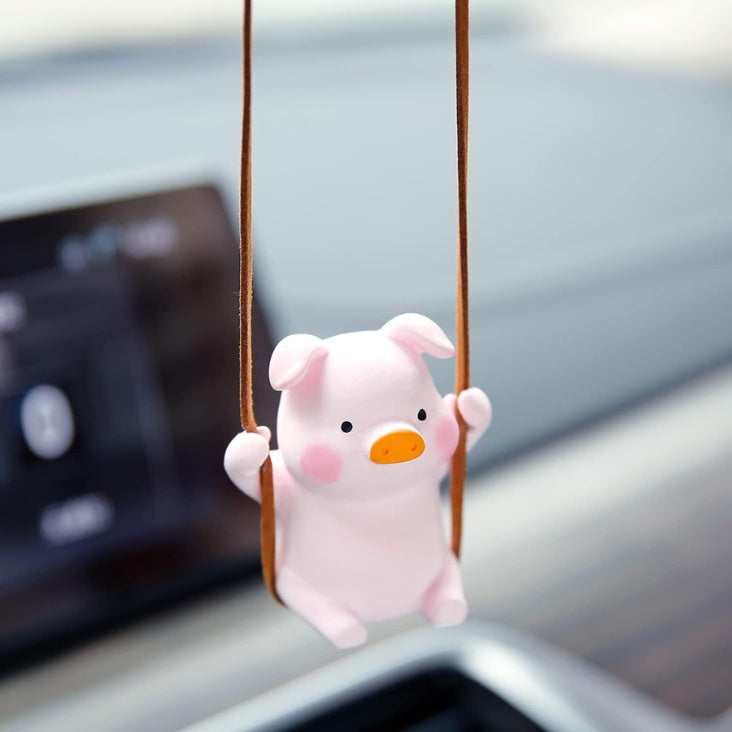 Swinging pig car mirror ornament – view 2